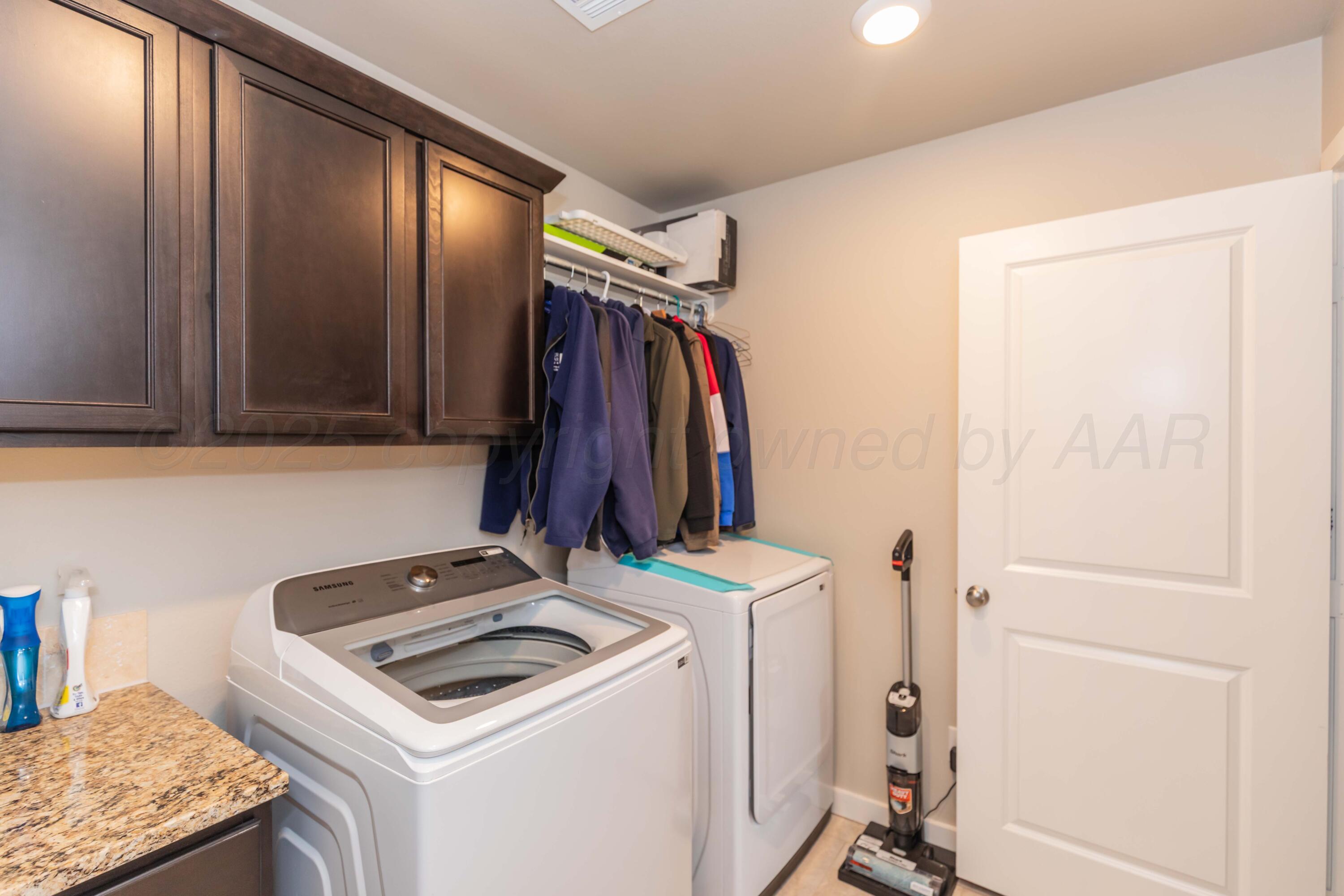 2600 Daybreak Lane Amarillo, TX 79124 - Photo 44 of 52 a view of a utility room with dryer and washer