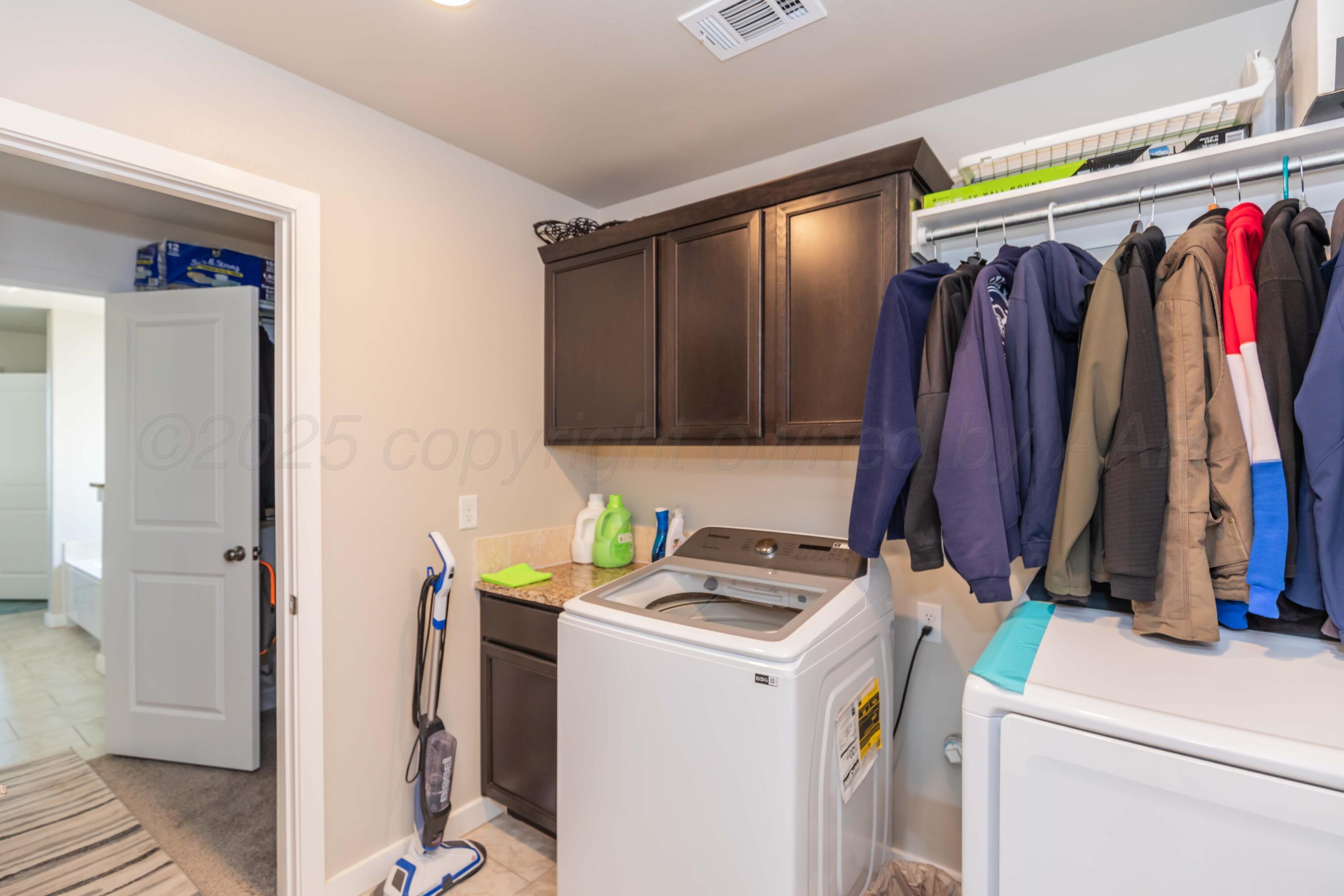 2600 Daybreak Lane Amarillo, TX 79124 - Photo 45 of 52 a view of walk in closet with clothes and shoes