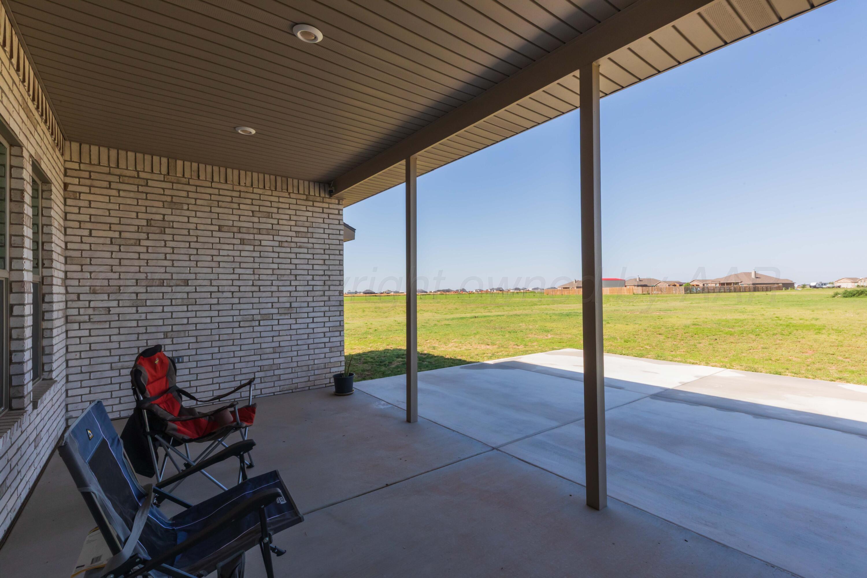 2600 Daybreak Lane Amarillo, TX 79124 - Photo 47 of 52 a view of a living room and floor to ceiling window