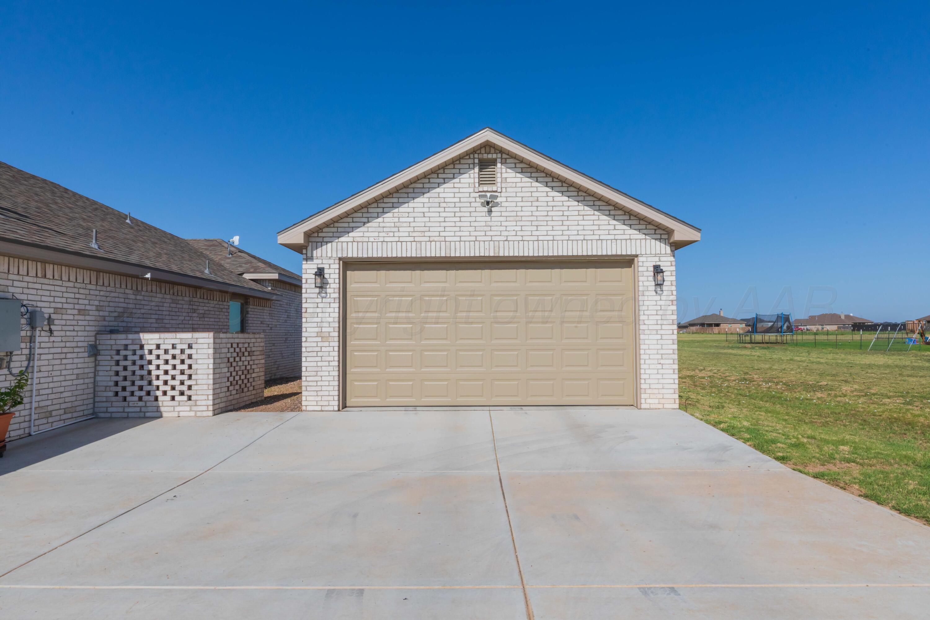 2600 Daybreak Lane Amarillo, TX 79124 - Photo 6 of 52 a view of backyard of house and lake
