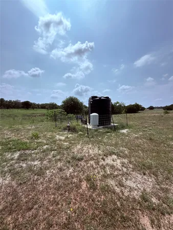 a view of a lake with a big yard