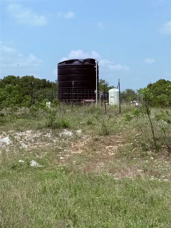 a view of a yard in front of a house