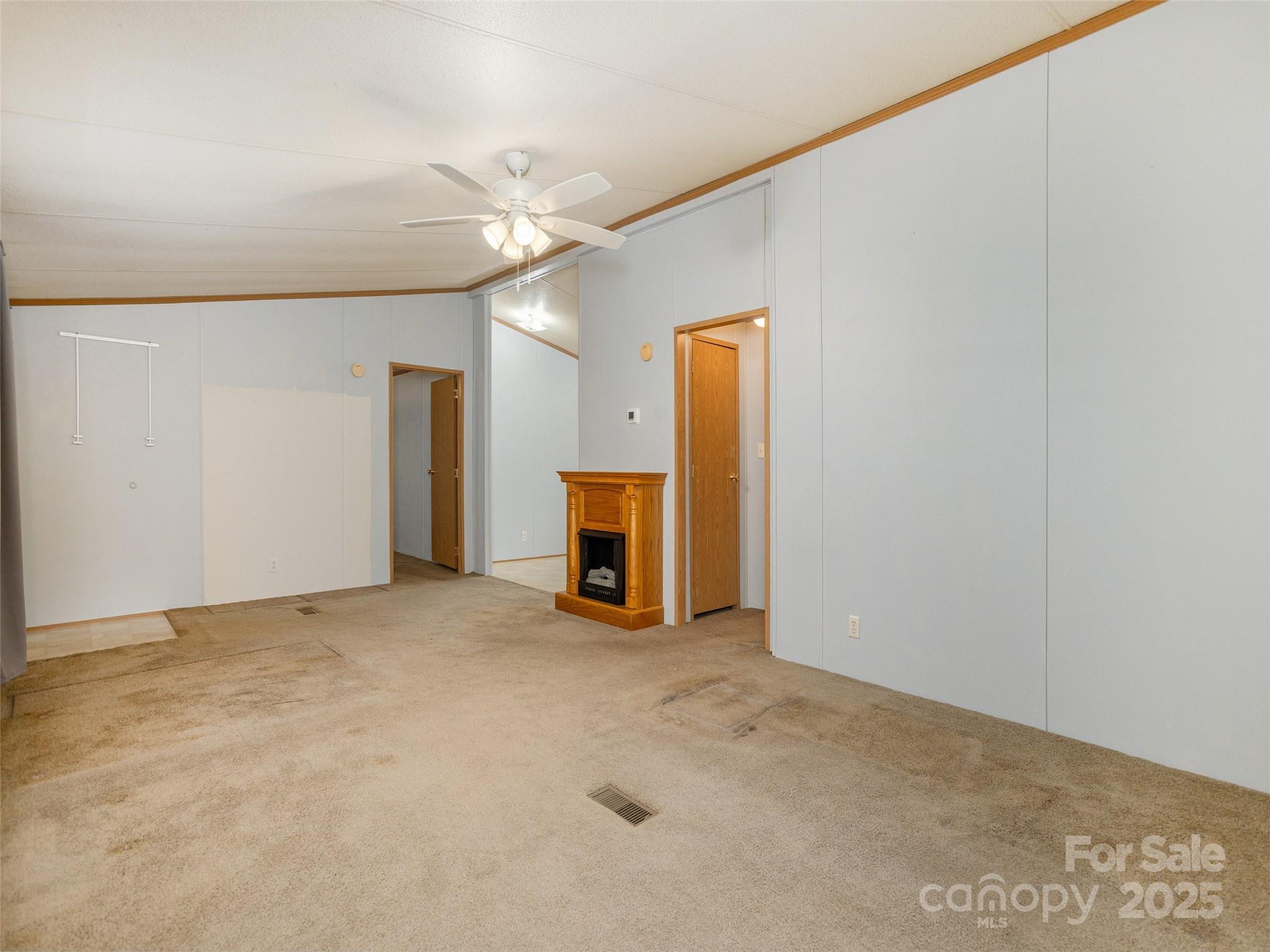 81 Mt Airy Road Marshall, NC 28753 - Photo 4 of 19 a view of an empty room with a fireplace