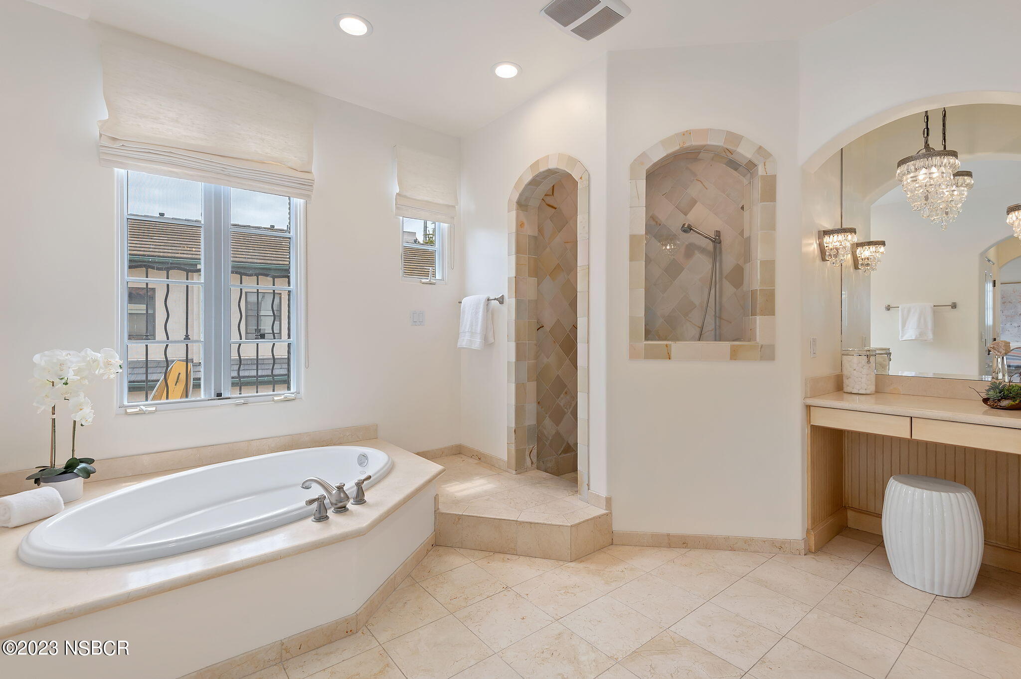4366 Modoc Road Santa Barbara, CA 93110 - Photo 15 of 23 a spacious bathroom with a tub sink and mirror