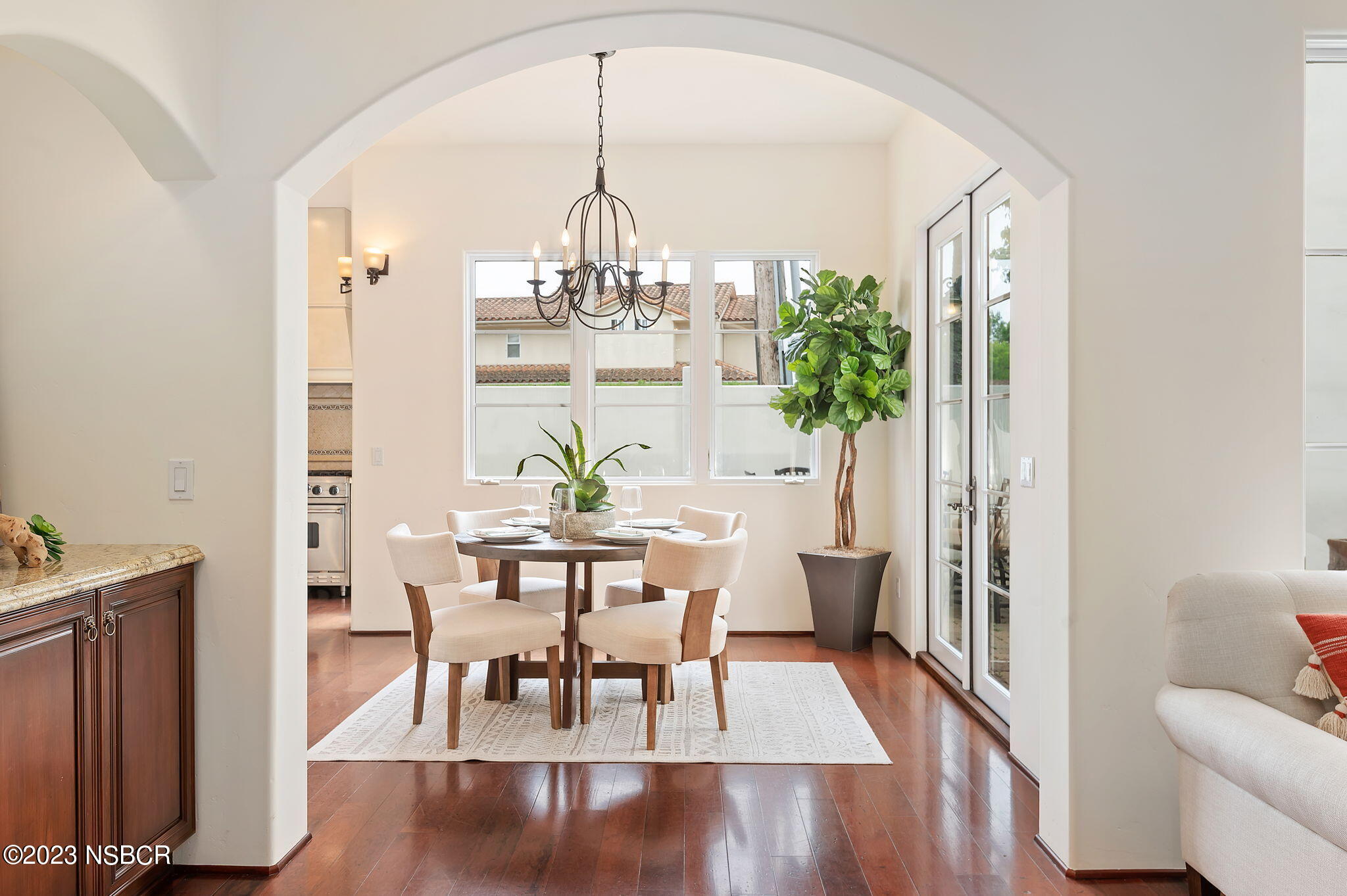 4366 Modoc Road Santa Barbara, CA 93110 - Photo 6 of 23 a view of a dining room with furniture window and wooden floor