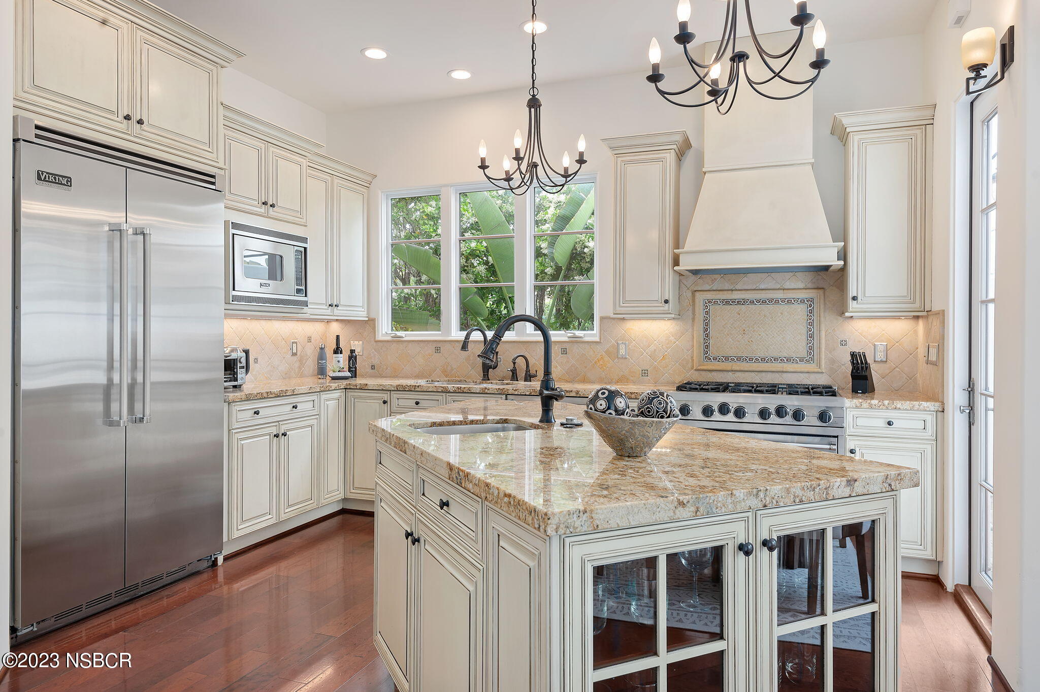 4366 Modoc Road Santa Barbara, CA 93110 - Photo 7 of 23 a kitchen with stainless steel appliances granite countertop a sink stove and refrigerator