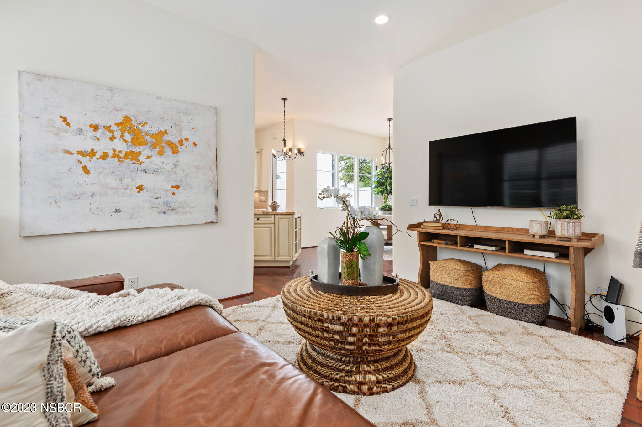 4366 Modoc Road Santa Barbara, CA 93110 - Photo 10 of 23 a living room with furniture and a flat screen tv