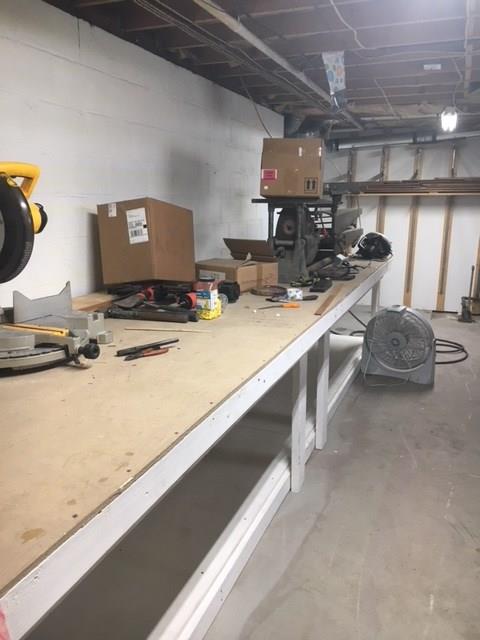 132 Moore Road Butler, PA 16001 - Photo 20 of 24 This is only HALF of the enormous workbench in the unfinished basement! Wow -- it extends along 2 full length walls!