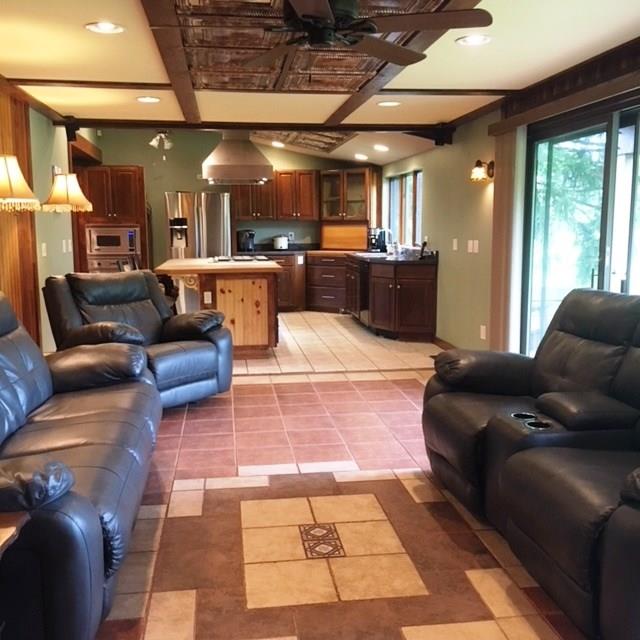 132 Moore Road Butler, PA 16001 - Photo 5 of 24 Open floor plan between family room and kitchen with beautiful views out back and a deck from which to enjoy the view!