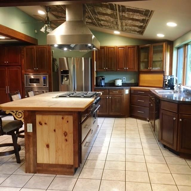 132 Moore Road Butler, PA 16001 - Photo 6 of 24 What a fun kitchen! Viking appliances (surprise!!!), updated cabinetry, wall oven, ample counter and cabinet space. Behind photographer is the family room. Turn left of the fridge and dining room is wide open to the kitchen also!