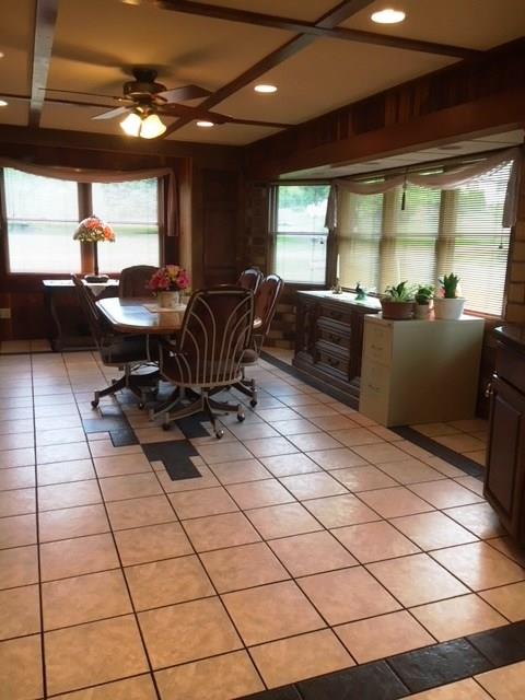 132 Moore Road Butler, PA 16001 - Photo 7 of 24 Wide open to the kitchen is this roomy dining room. Ceramic tile through both rooms. Recessed lighting and ceiling accents of different styles.