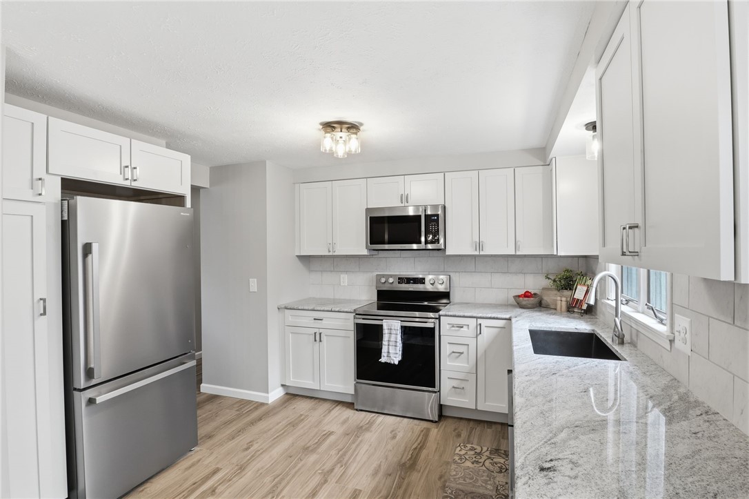 5644 Van Cruyningham Road Williamson, NY 14589 - Photo 12 of 30