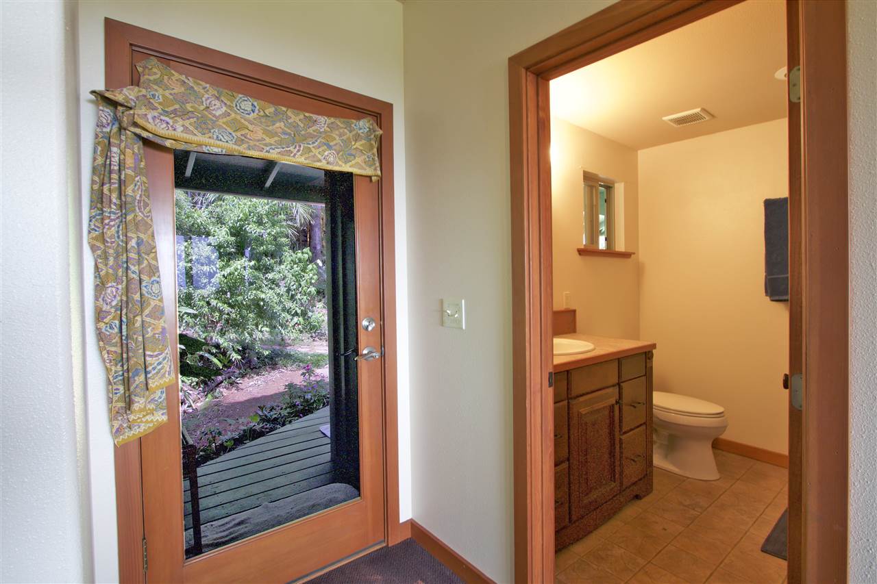 399 Omaopio Road, Unit B Kula, HI 96790 - Photo 21 of 30 a view of bathroom with a toilet shower and a sink