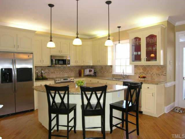 Professionally Designed Updated Kitchen Offering Granite Countertops, Tumbled Marble Backsplash, Stainless Appliances, Advantium Microwave with Convection Feature, KitchenAid Oven with Warming Drawer, Rollout Shelves and More! Other