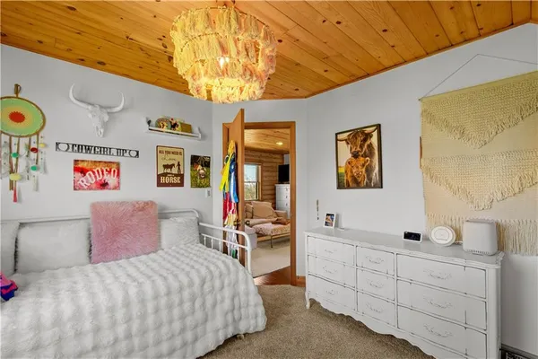 a bedroom with furniture and window
