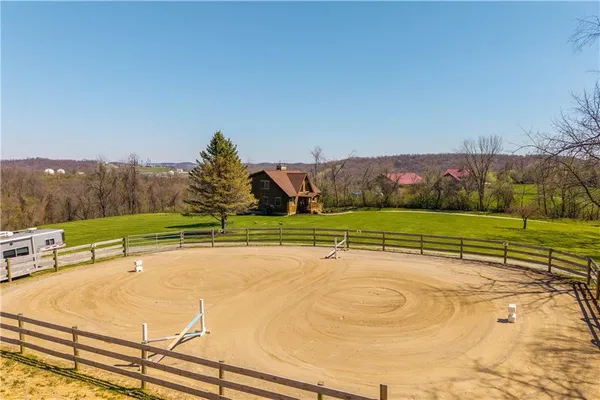 a view of an outdoor space and tennis court
