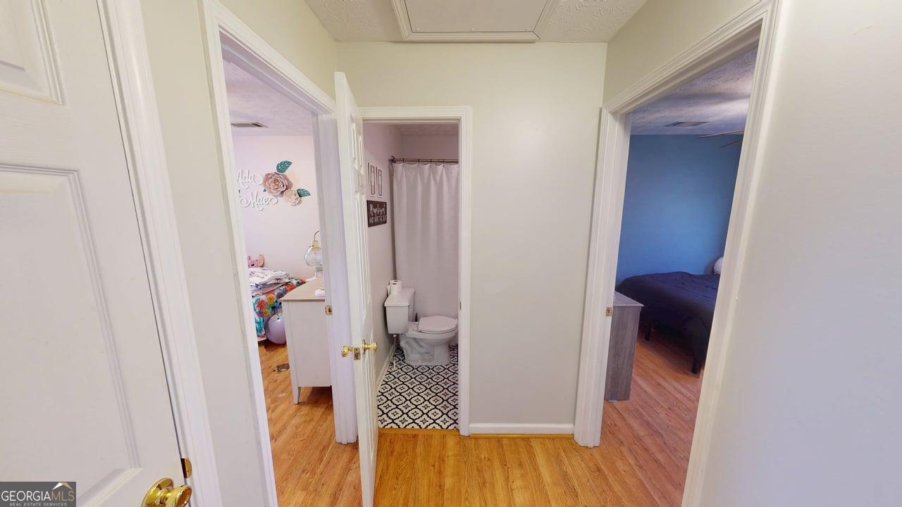 2124 Broad Street Statham, GA 30666 - Photo 23 of 35 wooden floor in a gallery