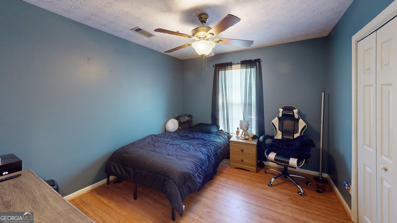 2124 Broad Street Statham, GA 30666 - Photo 26 of 35 a workspace with furniture and a window