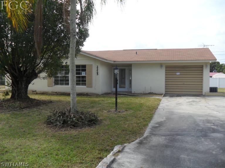 2225 Caladium Road Fort Myers, FL 33905 - Photo 1 of 9 a house view with a garden space