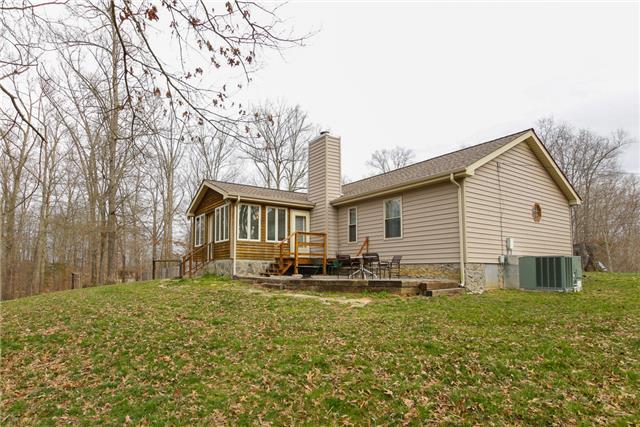 833 Balthrop Road Chapmansboro, TN 37035 - Photo 3 of 20 Enclosed deck/sun room