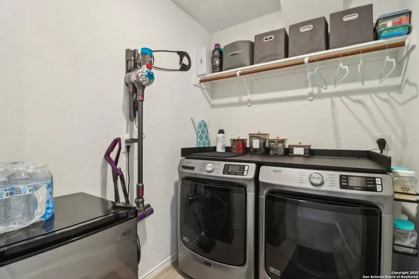 a kitchen with a stove and a sink