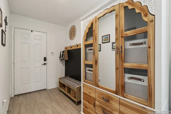 a room with closet and mirror