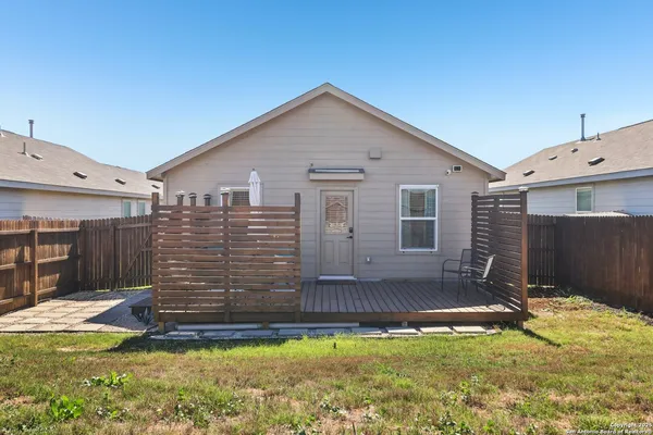 a view of a backyard with a small cabin