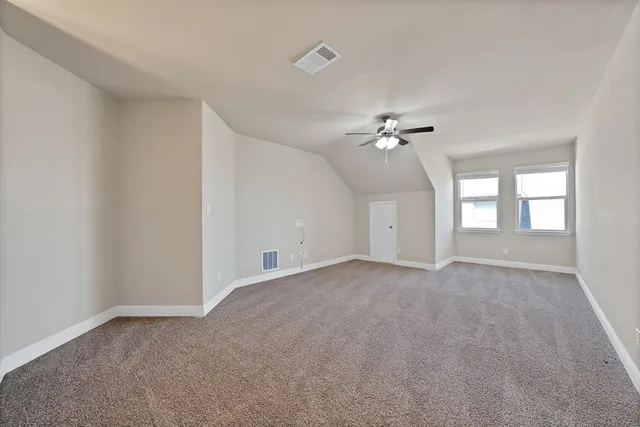 a view of gallery with wooden floor
