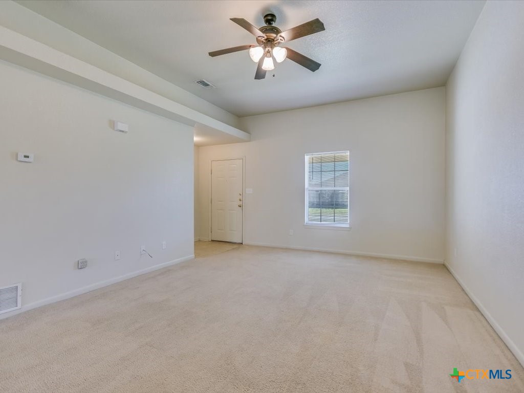 3805 El Paso Drive, Unit A Killeen, TX 76549 - Photo 9 of 20 a view of room with a ceiling fan and window