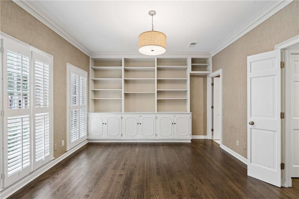 17 Muscogee Way Northwest Atlanta, GA 30305 - Photo 22 of 40 wooden floor in an empty room with a window