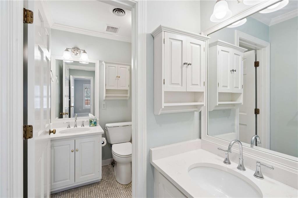 17 Muscogee Way Northwest Atlanta, GA 30305 - Photo 28 of 40 a bathroom with a sink double vanity and a mirror