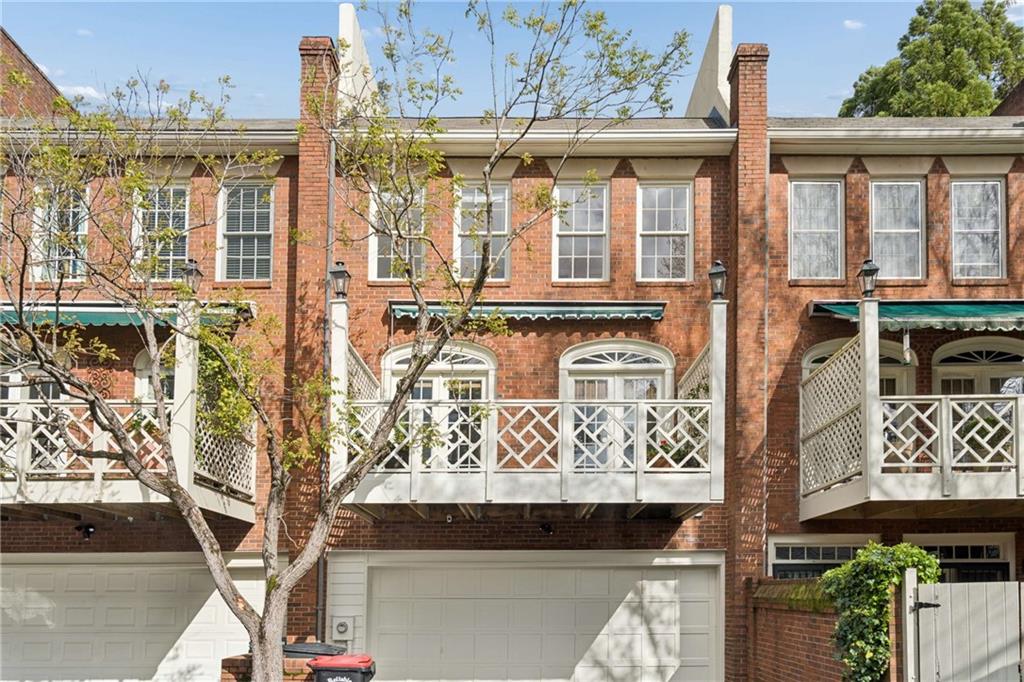 17 Muscogee Way Northwest Atlanta, GA 30305 - Photo 3 of 40 a front view of a building with a tree