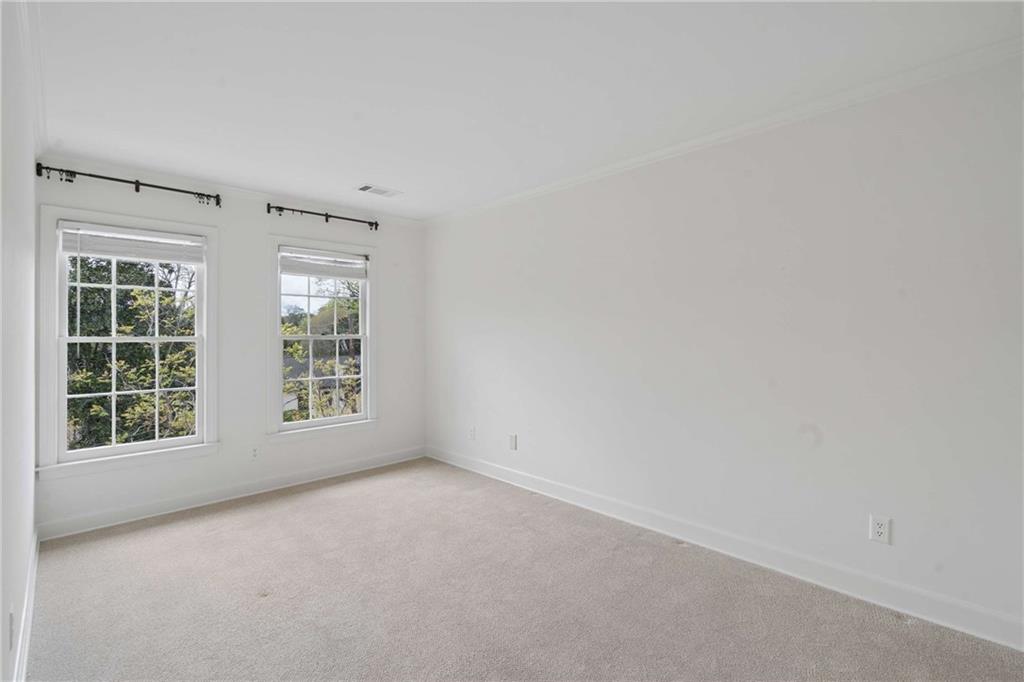 17 Muscogee Way Northwest Atlanta, GA 30305 - Photo 31 of 40 an empty room with a window