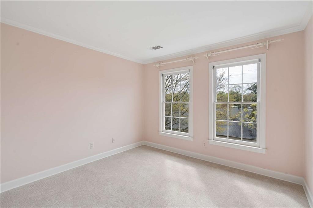 17 Muscogee Way Northwest Atlanta, GA 30305 - Photo 33 of 40 an empty room with a window