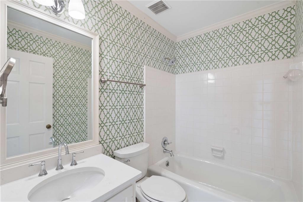 17 Muscogee Way Northwest Atlanta, GA 30305 - Photo 35 of 40 a bathroom with a sink toilet and shower