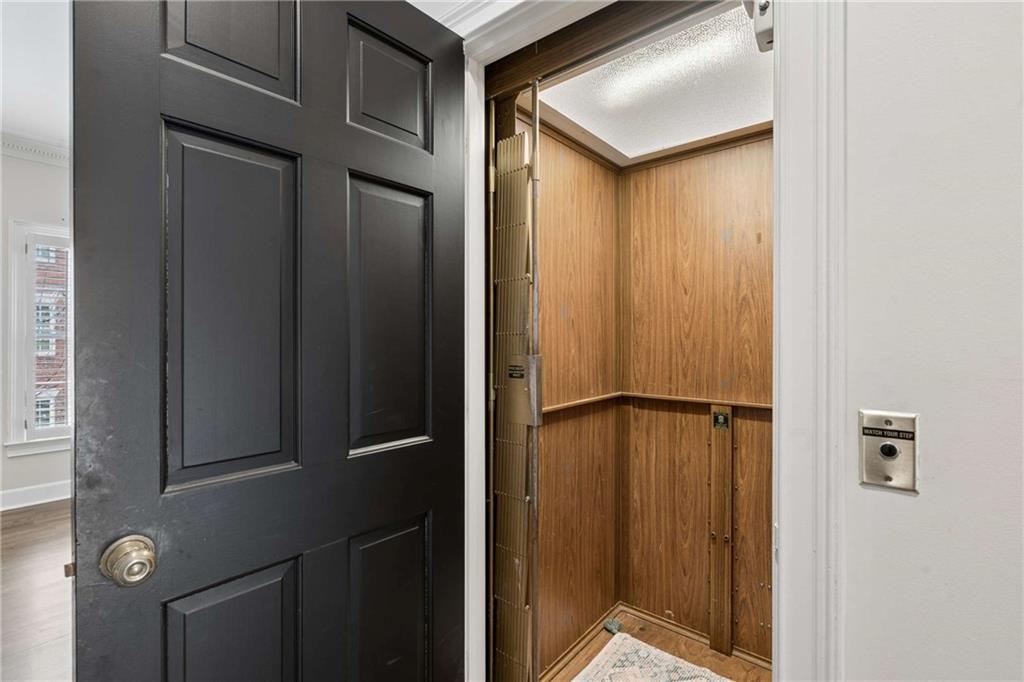 17 Muscogee Way Northwest Atlanta, GA 30305 - Photo 8 of 40 a bathroom with a shower and a mirror