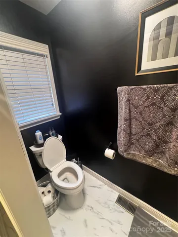 a house view with a outdoor space