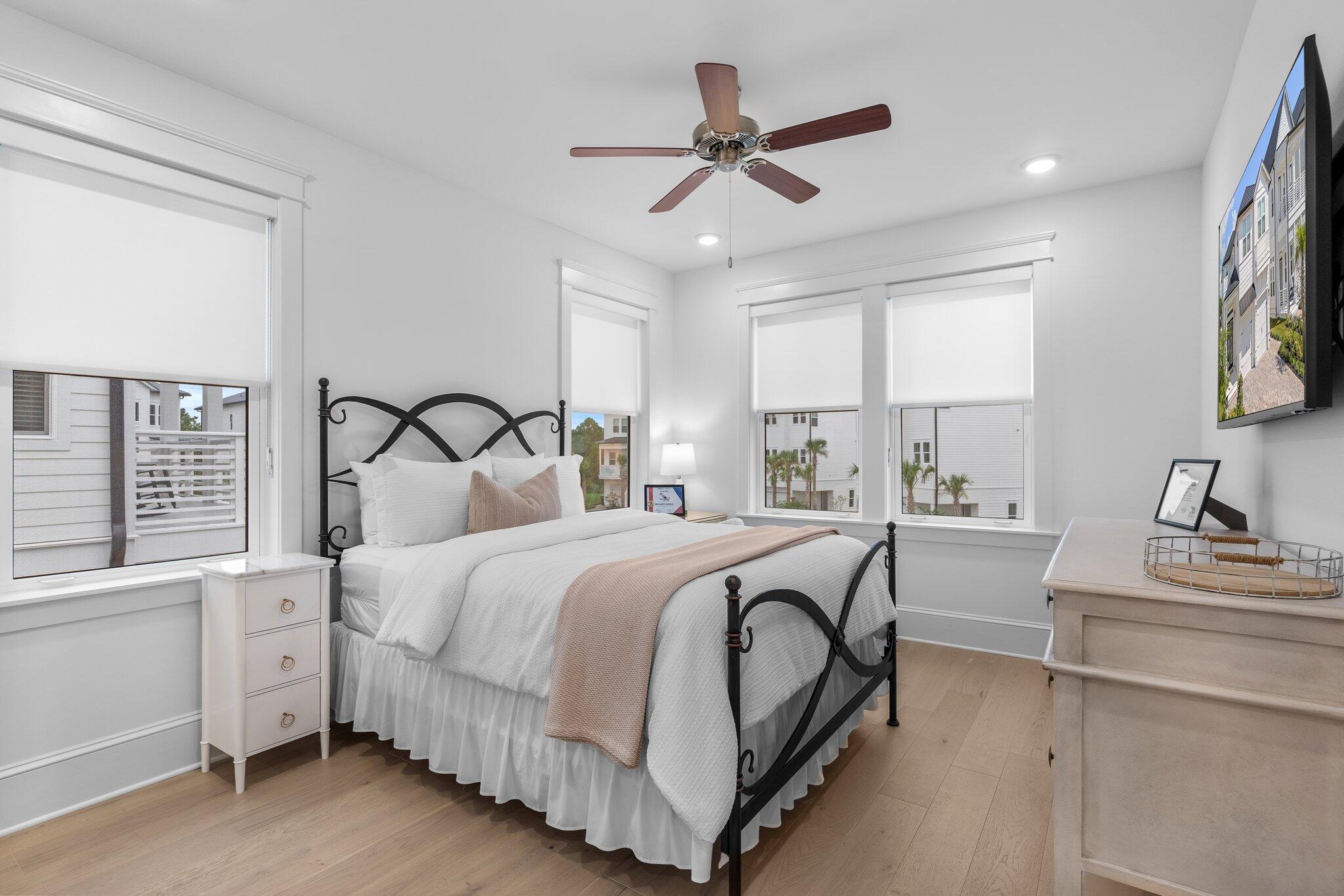 105 Seaboard Lane Santa Rosa Beach, FL 32459 - Photo 26 of 54 a bedroom with bed and window