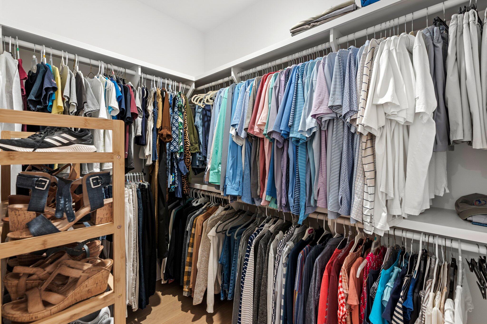 105 Seaboard Lane Santa Rosa Beach, FL 32459 - Photo 36 of 54 a view of walk in closet with clothes and shoes