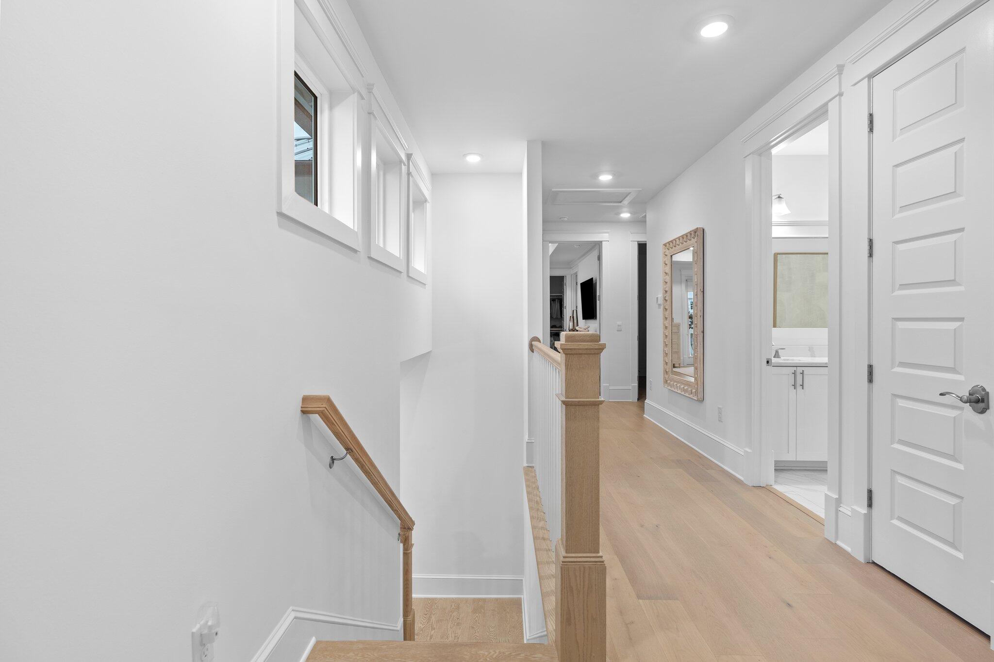 105 Seaboard Lane Santa Rosa Beach, FL 32459 - Photo 43 of 54 a view of entryway with white walls and stairs