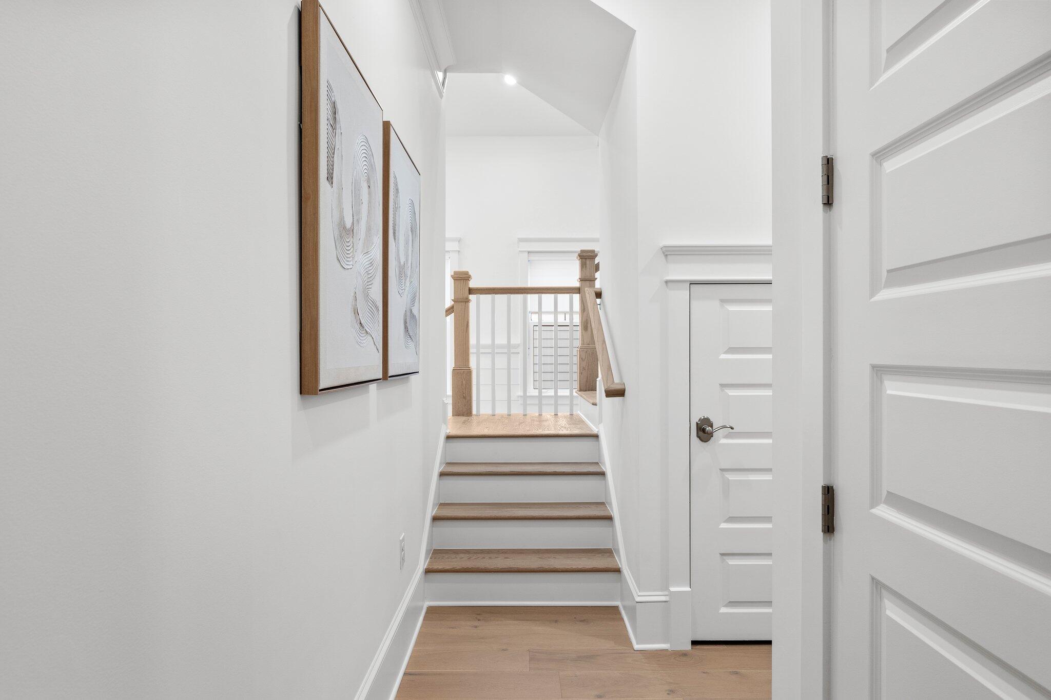 105 Seaboard Lane Santa Rosa Beach, FL 32459 - Photo 44 of 54 a view of entryway and hall with wooden floor