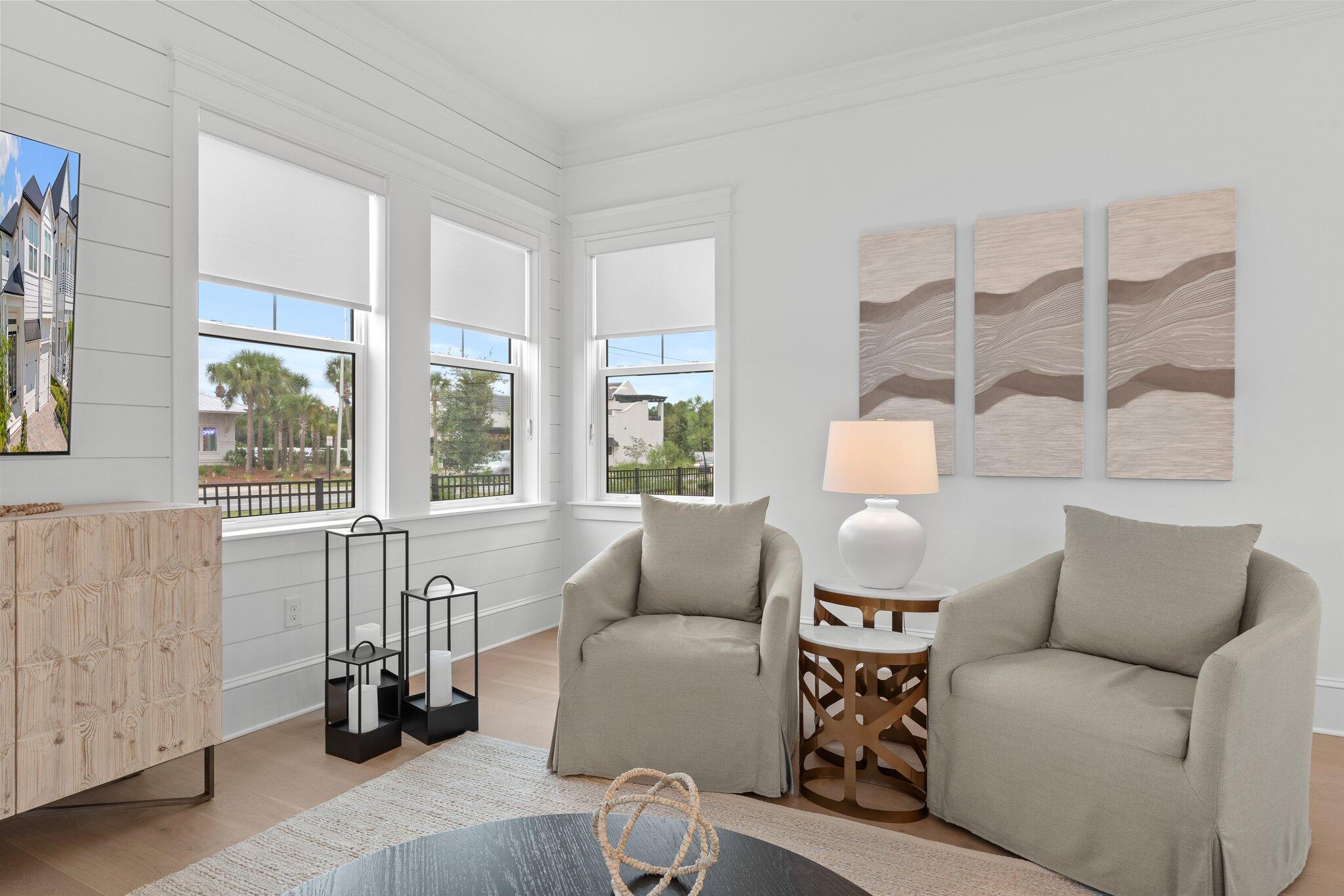 105 Seaboard Lane Santa Rosa Beach, FL 32459 - Photo 6 of 54 a living room with furniture and a large window