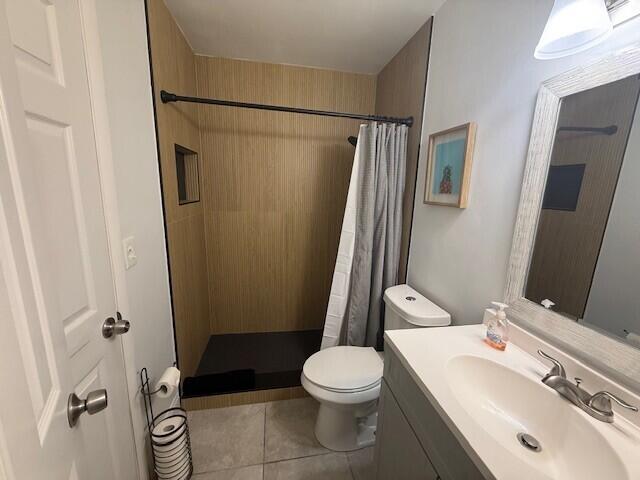 325 Southwest 4th Avenue Delray Beach, FL 33444 - Photo 12 of 16 a bathroom with a sink toilet and shower
