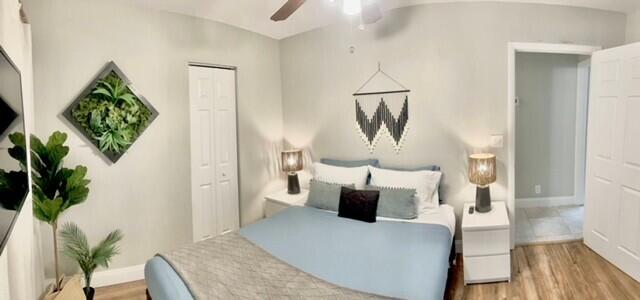 325 Southwest 4th Avenue Delray Beach, FL 33444 - Photo 14 of 16 a living room with furniture and a potted plant