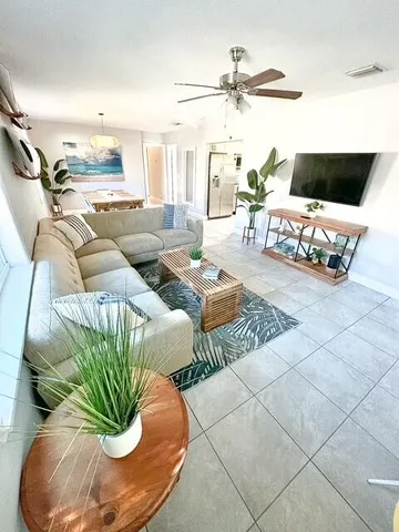 a view of a living room and dining room