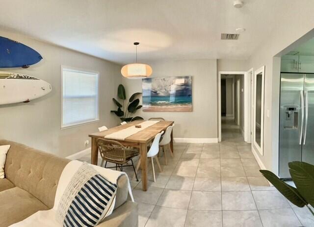325 Southwest 4th Avenue Delray Beach, FL 33444 - Photo 5 of 16 a living room with furniture and a table
