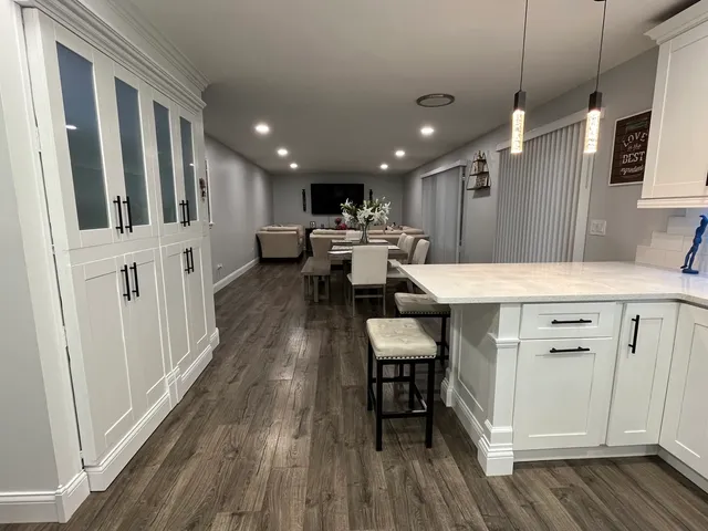 a view of a kitchen from the hallway