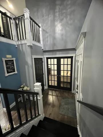 a view of a chairs and table in a room