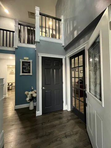a view of livingroom with furniture and windows