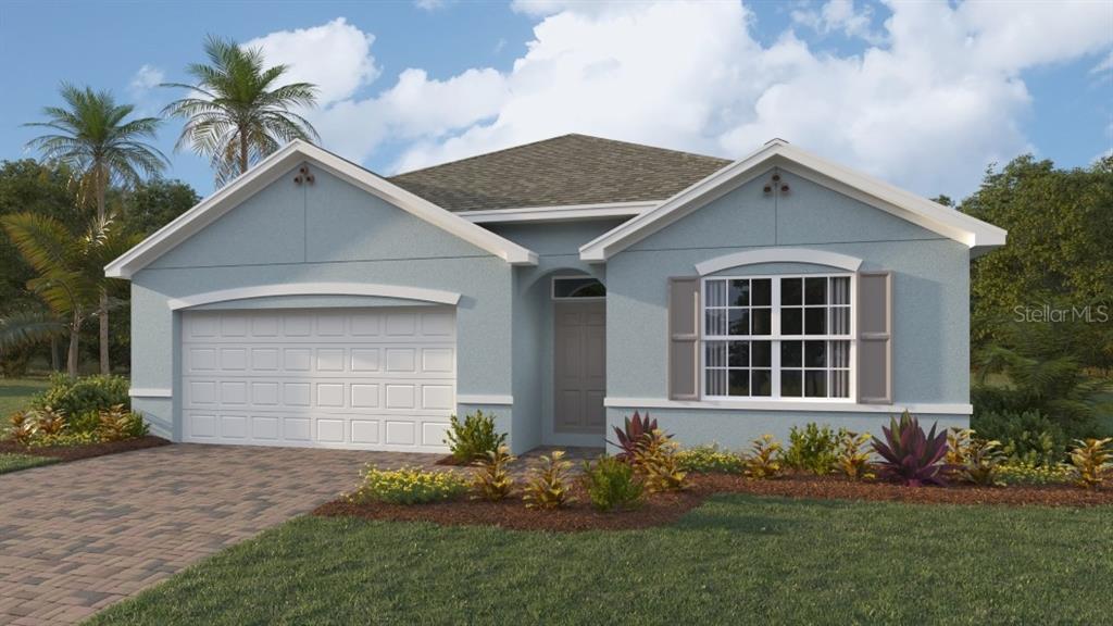 9572 Turtle Grass Circle Punta Gorda, FL 33950 - Photo 1 of 1 a front view of a house with a garden and plants